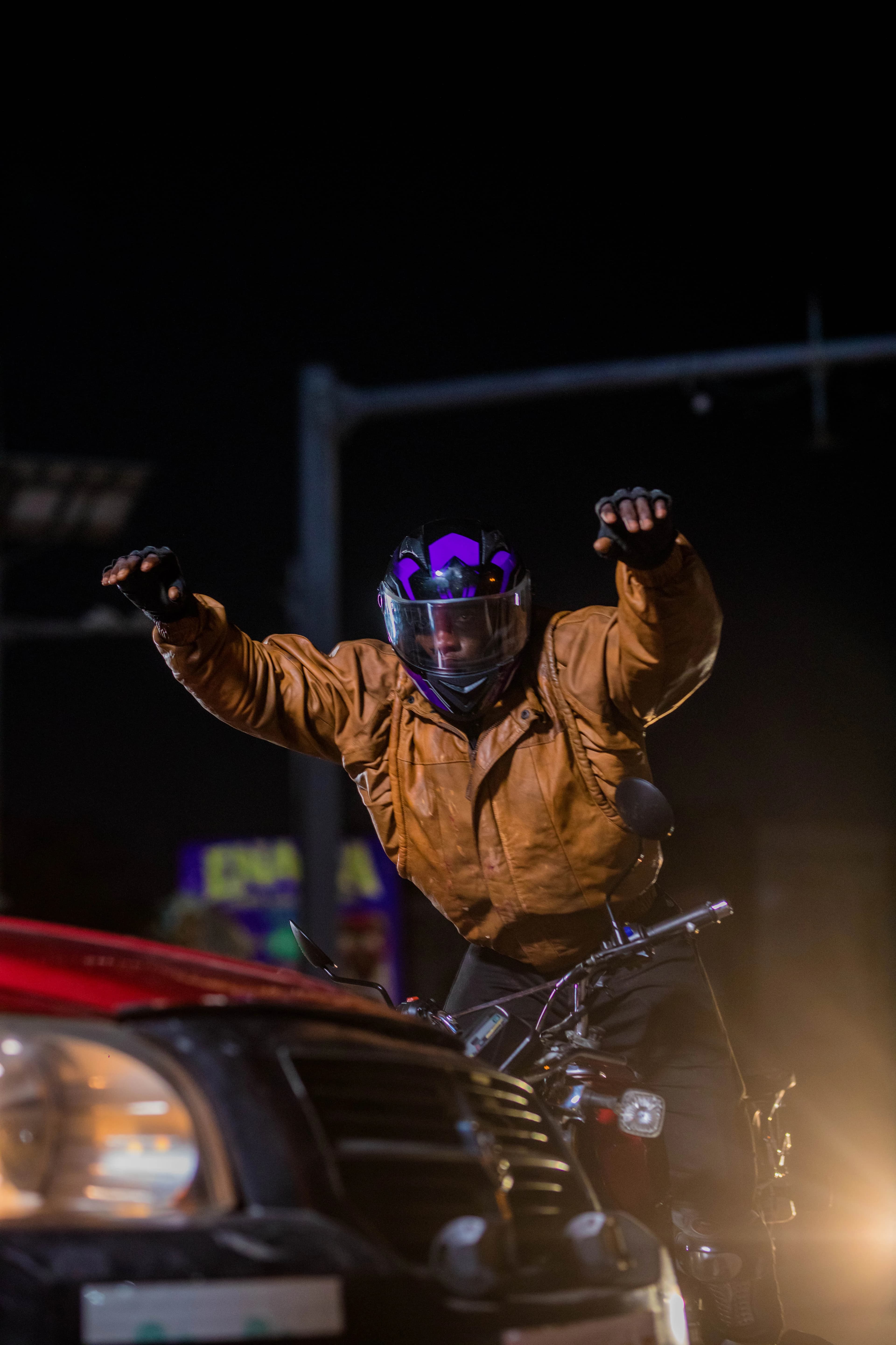 A camera operator behind a cinema camera on a night shoot